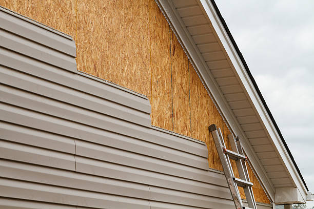 Professional Siding Repair technician working in Cabin John, MD